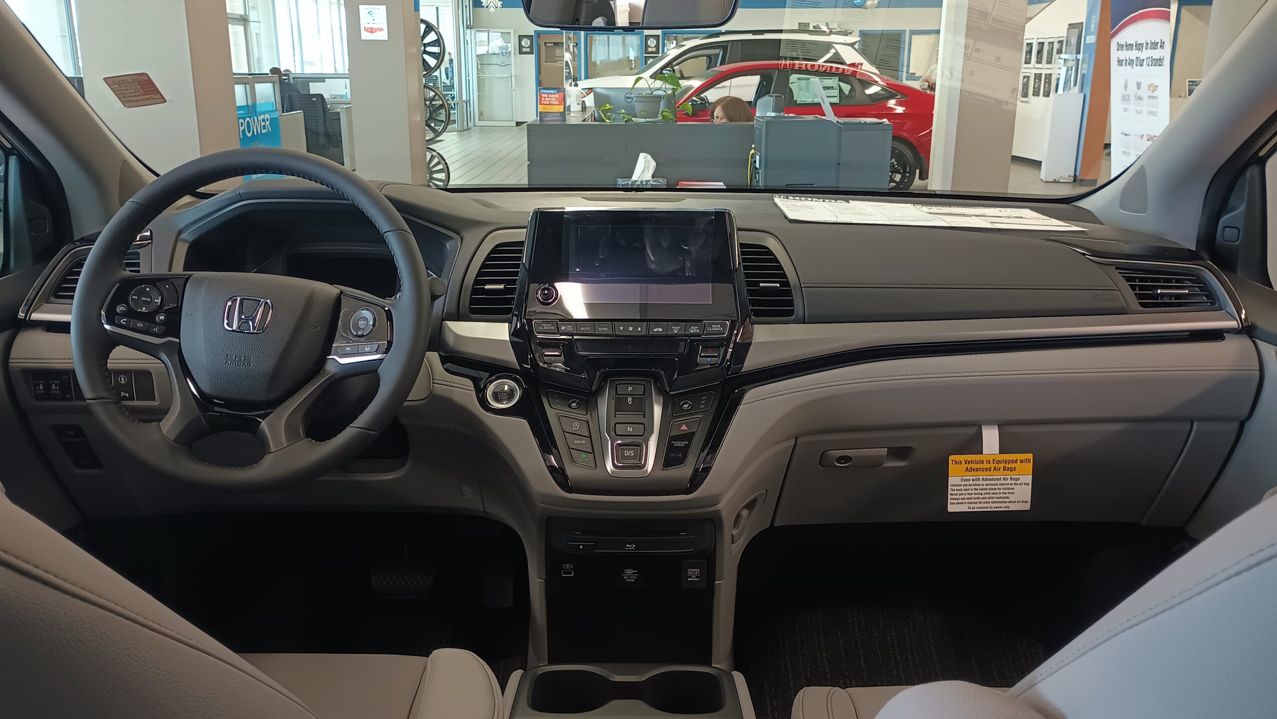 Honda Odyssey dashboard with infotainment screen, relevant to HondaLink troubleshooting