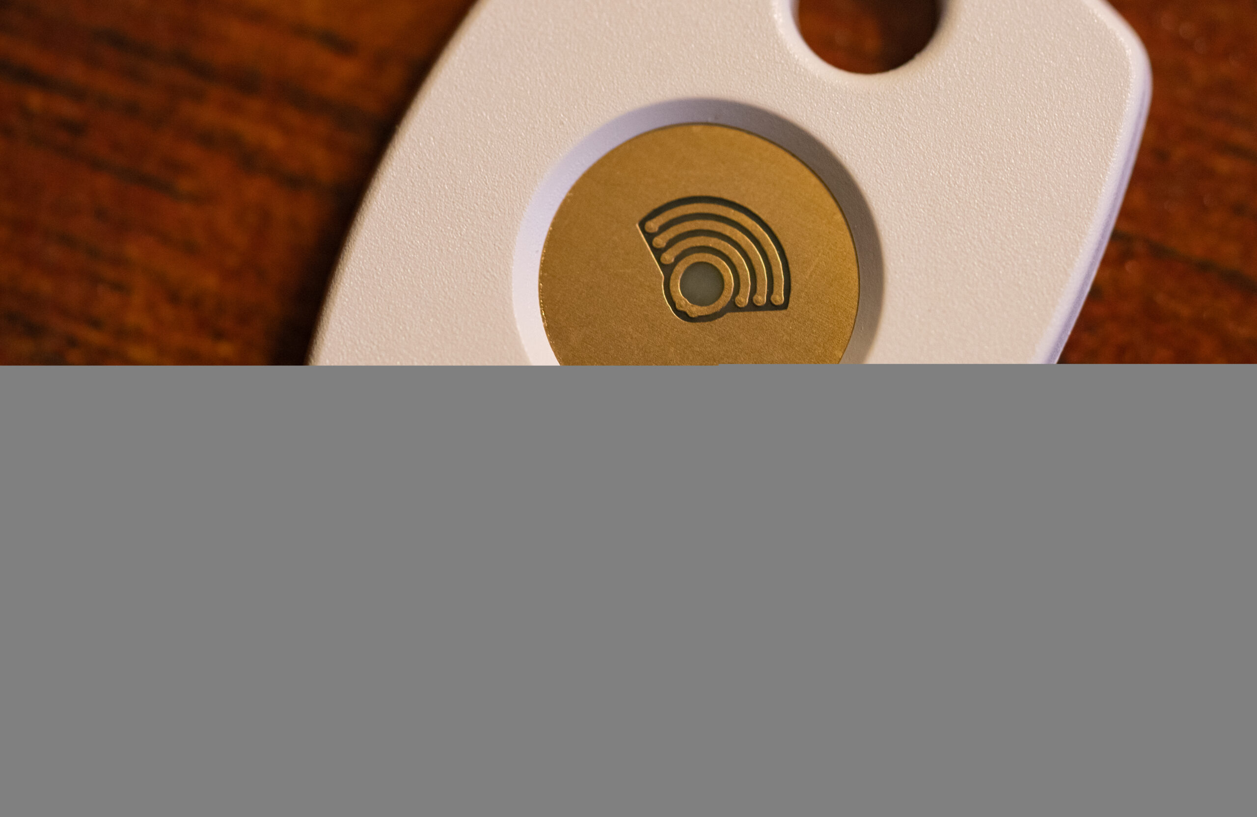 Passkeys vs password managers represented by a Google Titan Security Key used for stronger account sign-ins.