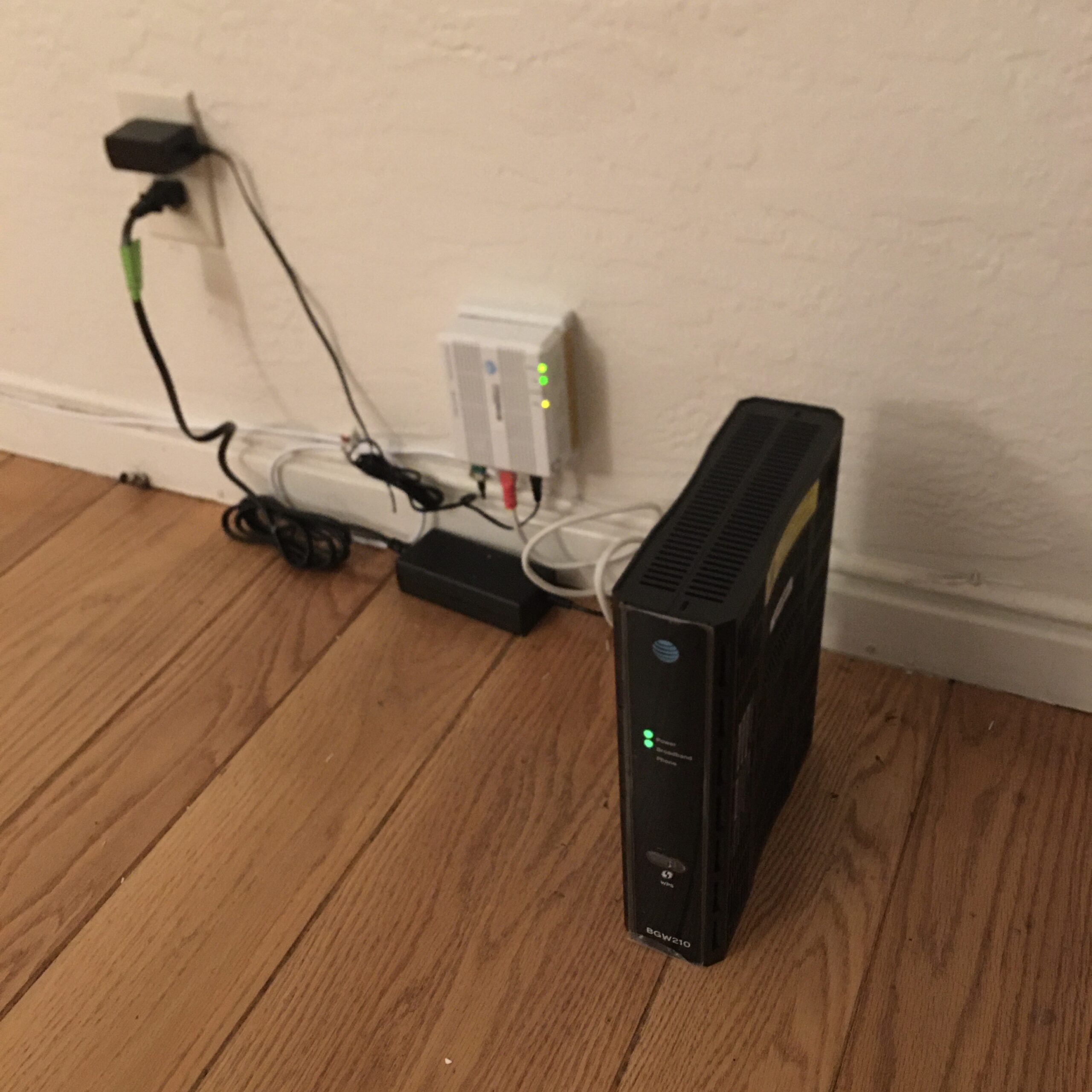 Home Wi-Fi equipment representing how to share a Wi-Fi password between iPhone and Android.
