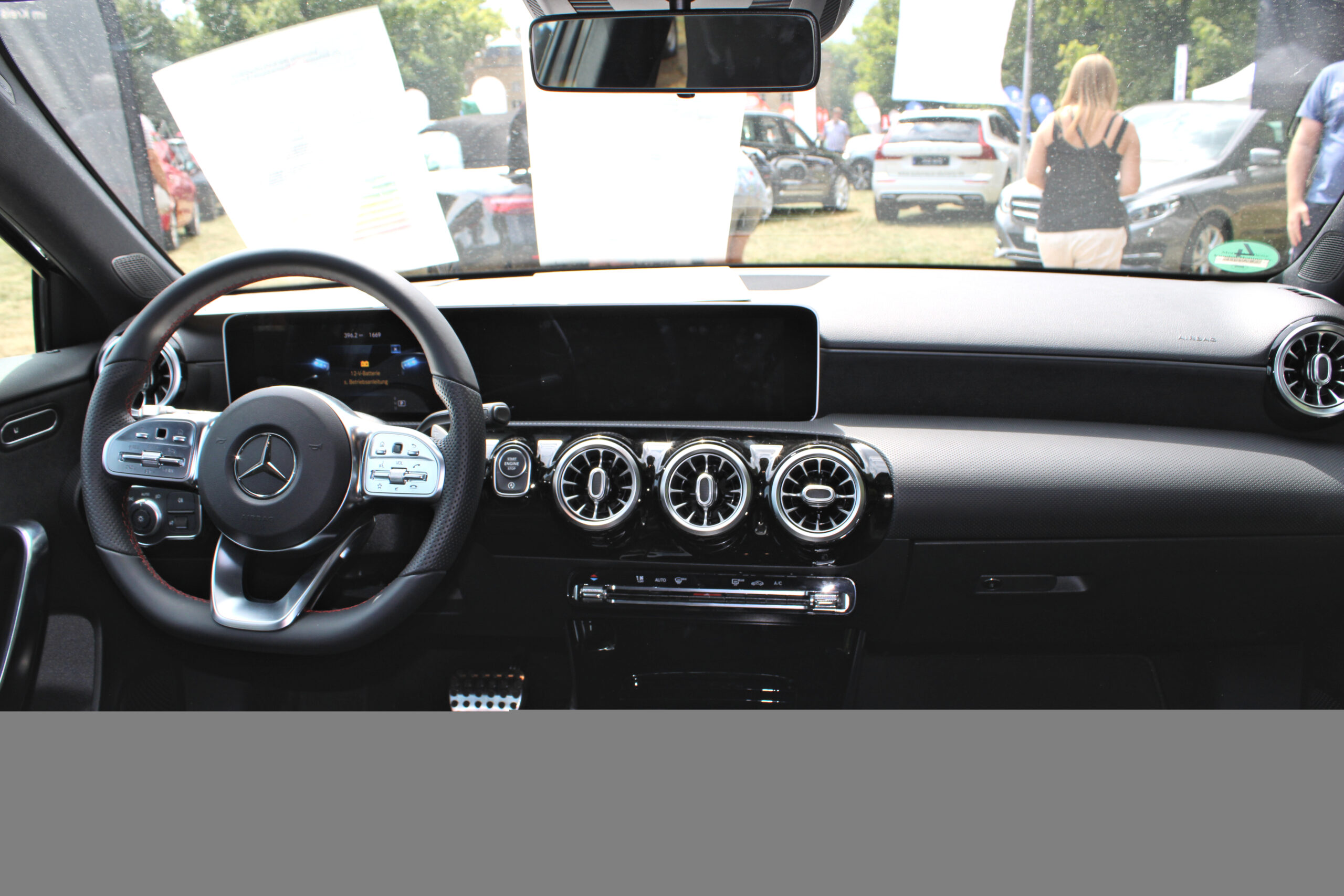 Mercedes A-Class interior with MBUX dashboard, steering wheel, and center display